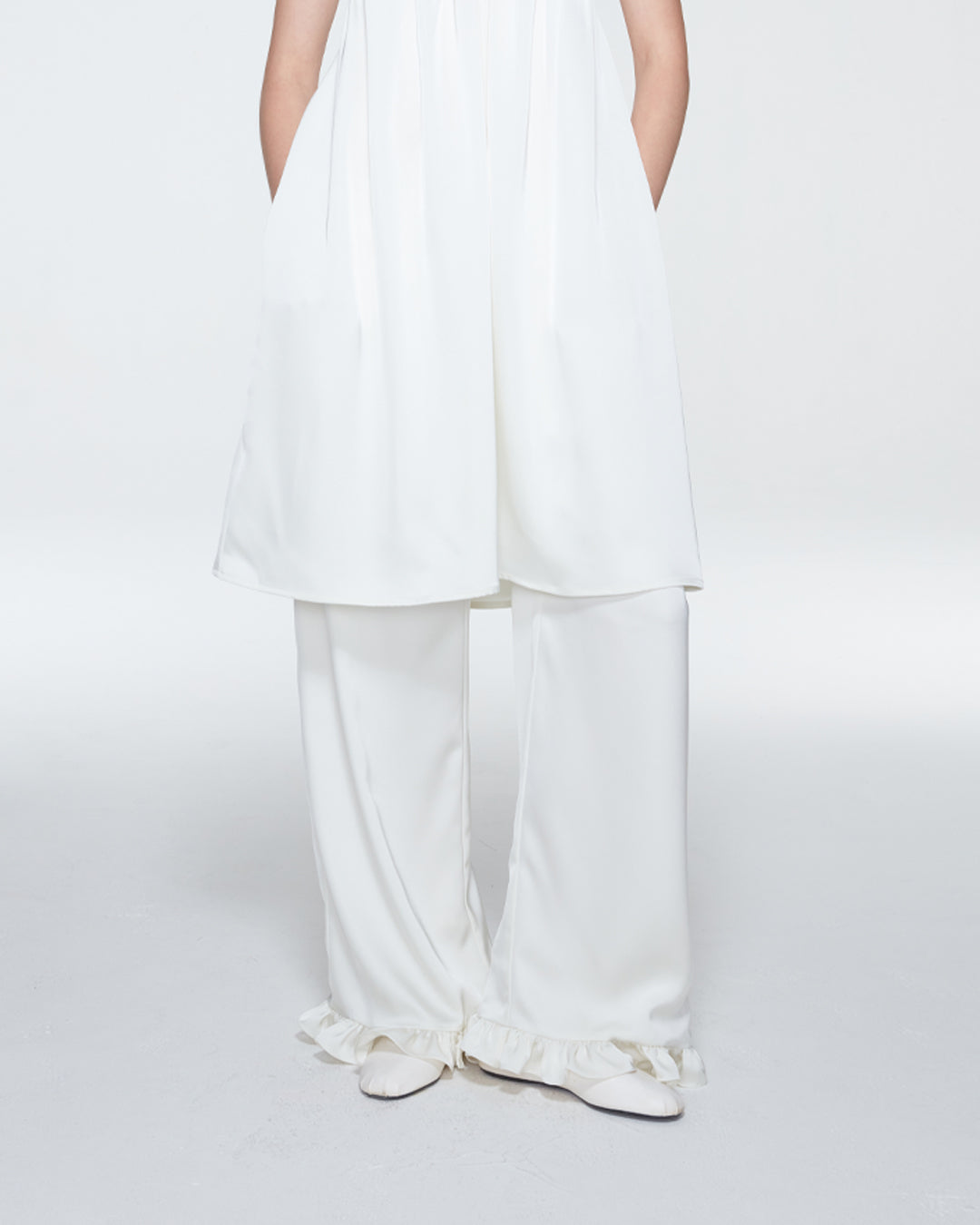 SATIN PANTS WITH RUFFLE HEM